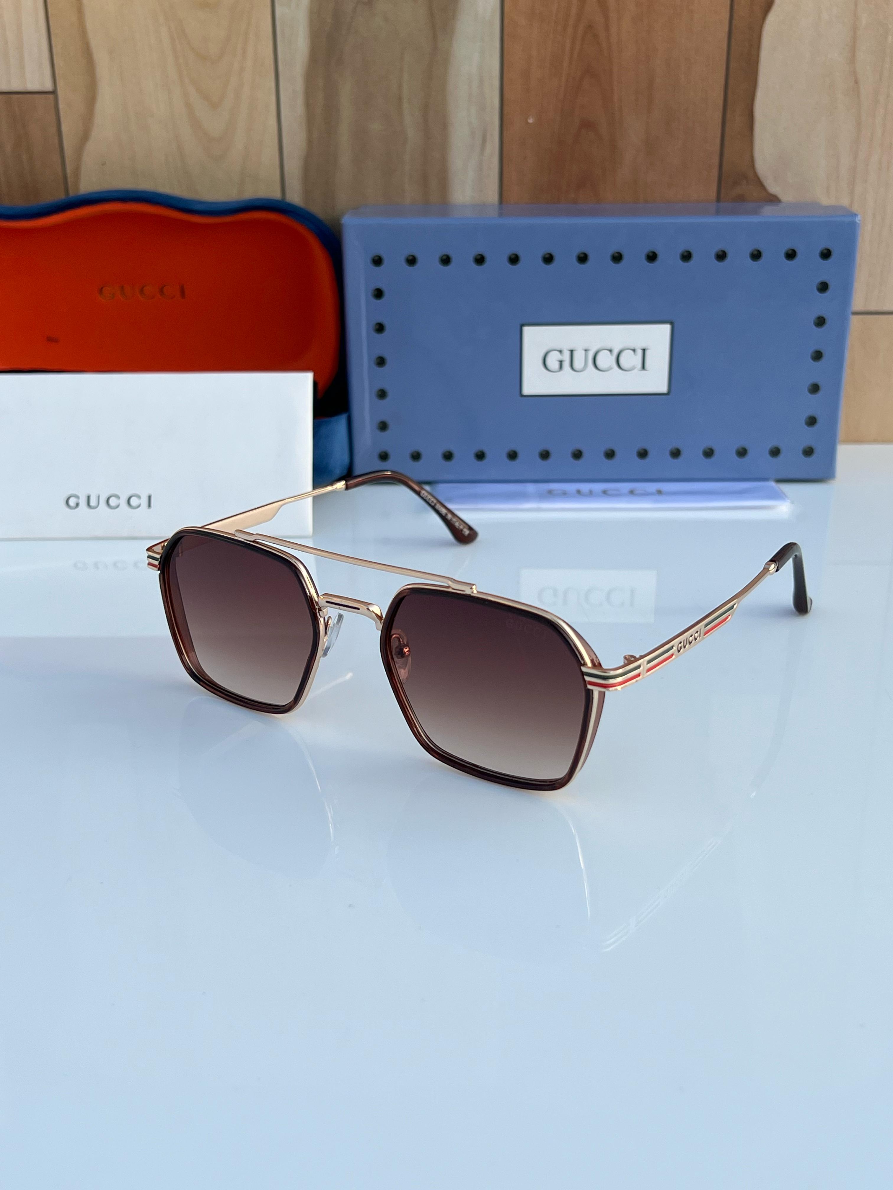 Gu_cci 5064 golden brown sunglass